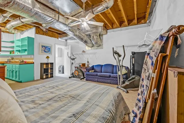 a view of living room with furniture and floor to ceiling windows