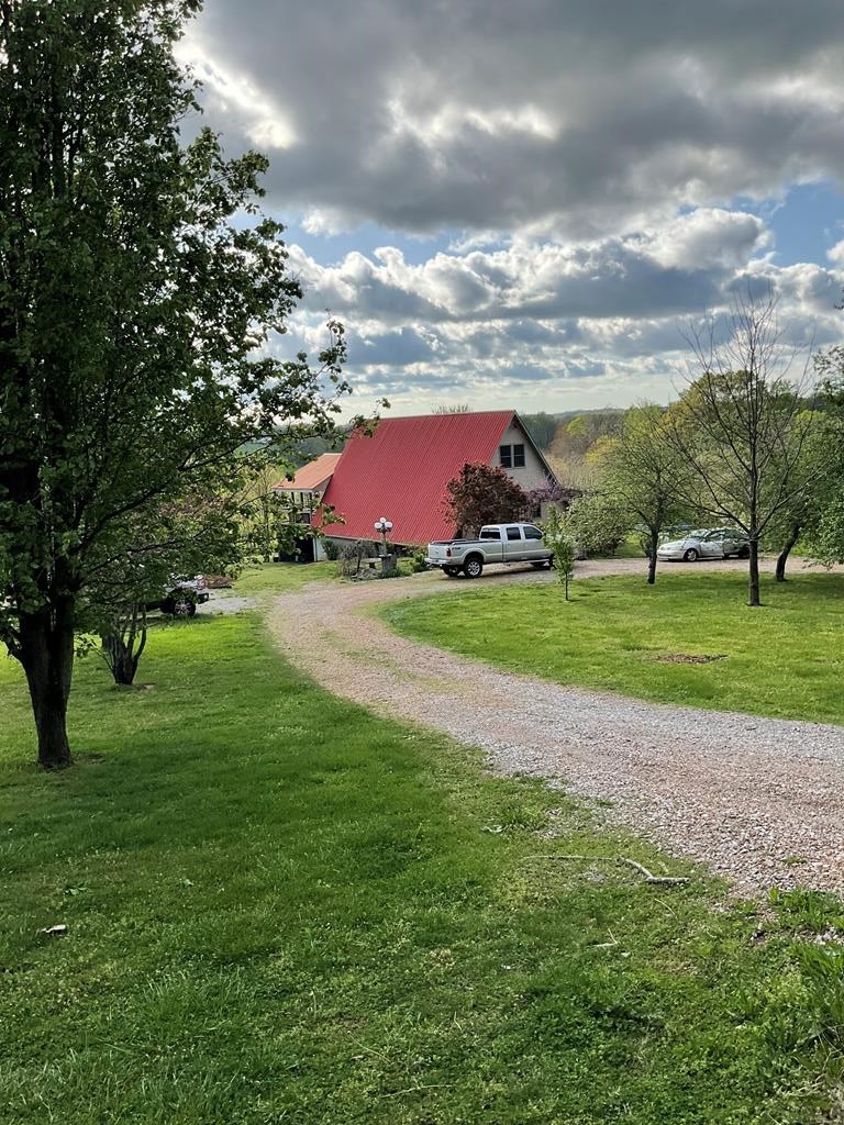 355 Dillon Gribble Road Sparta, TN 38583 - Photo 43 of 45 a view of a yard with an trees