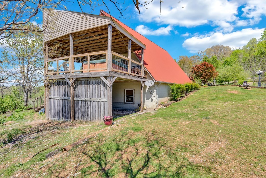 355 Dillon Gribble Road Sparta, TN 38583 - Photo 6 of 45 a view of house with backyard and entertaining space