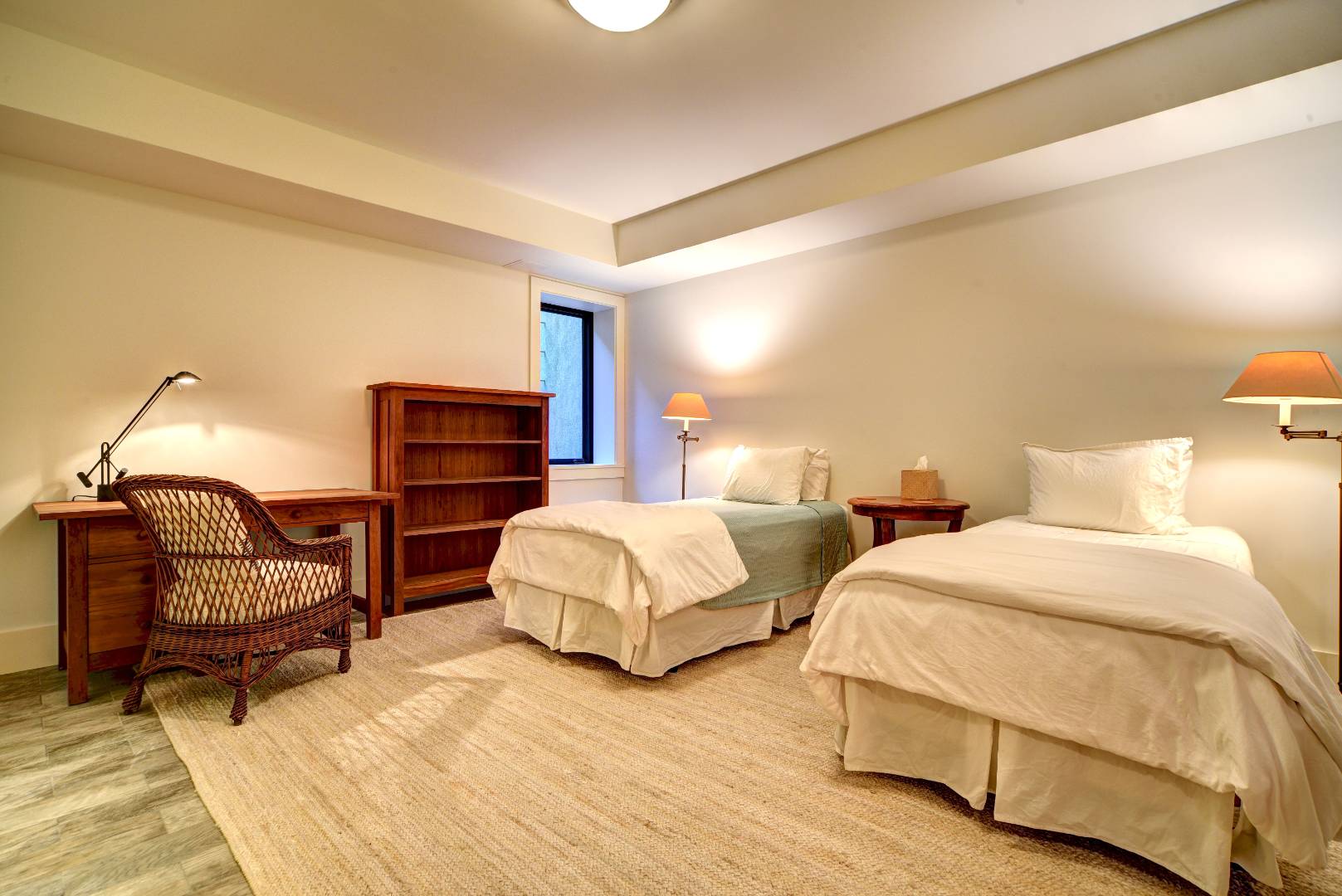 295 Main Street Sag Harbor, NY 11963 - Photo 17 of 21 a bedroom with two beds and a chair