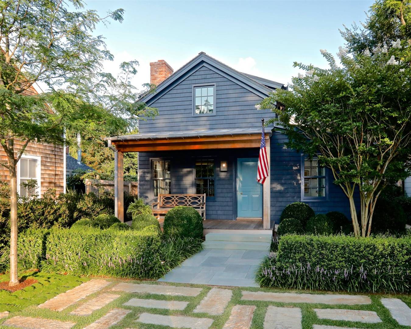 295 Main Street Sag Harbor, NY 11963 - Photo 2 of 21 a front view of a house with garden