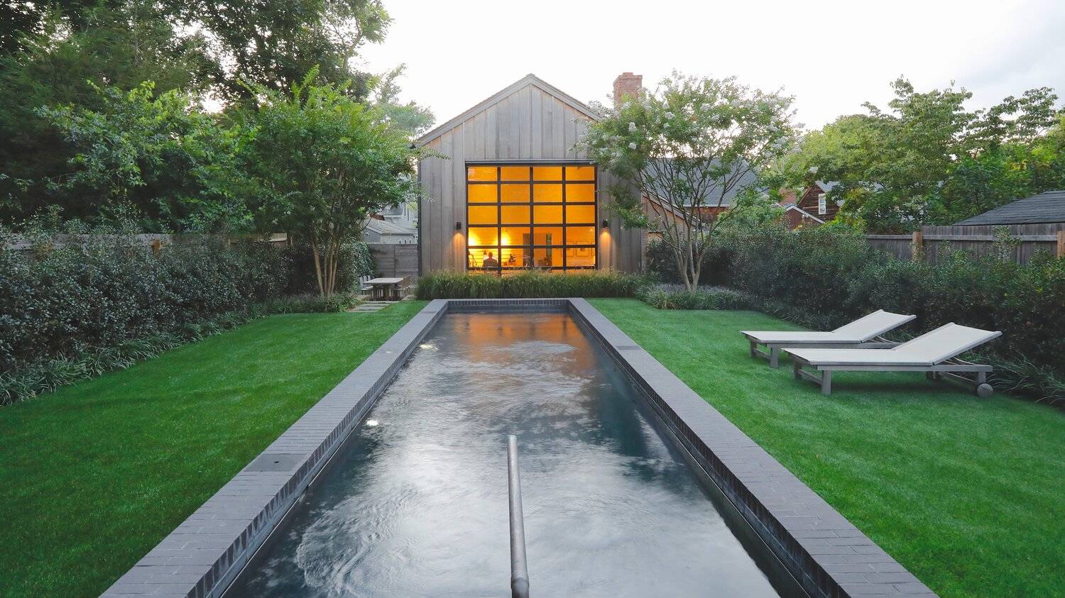 295 Main Street Sag Harbor, NY 11963 - Photo 21 of 21 a view of a backyard with a garden and plants