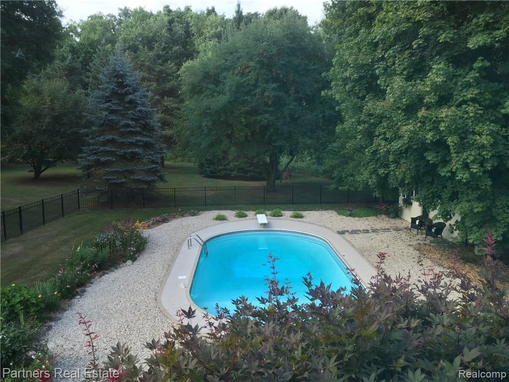 4400 Golf Club Road Howell, MI 48843 - Photo 46 of 68 View from upper bedroom window overlooking rear