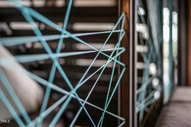 a view of house with wooden floor and a potted plant