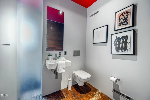 a bathroom with a mirror