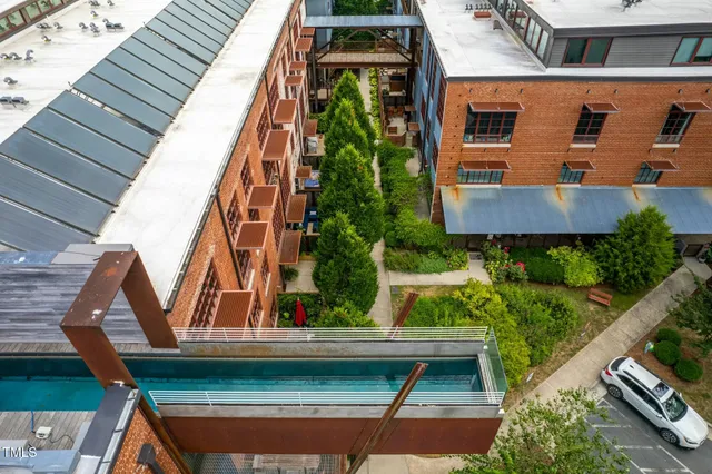 a view of a balcony with wooden floor
