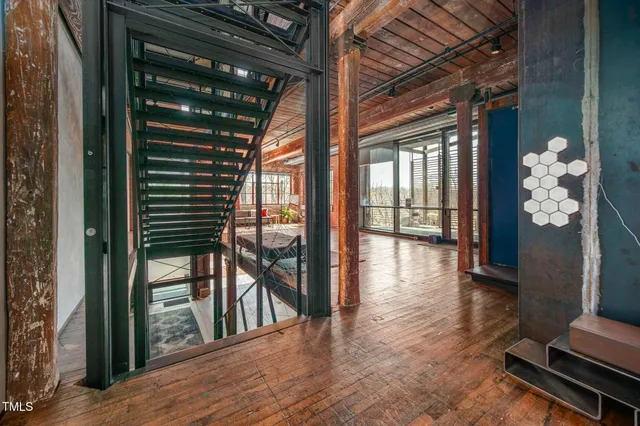 a view of entryway with wooden floor