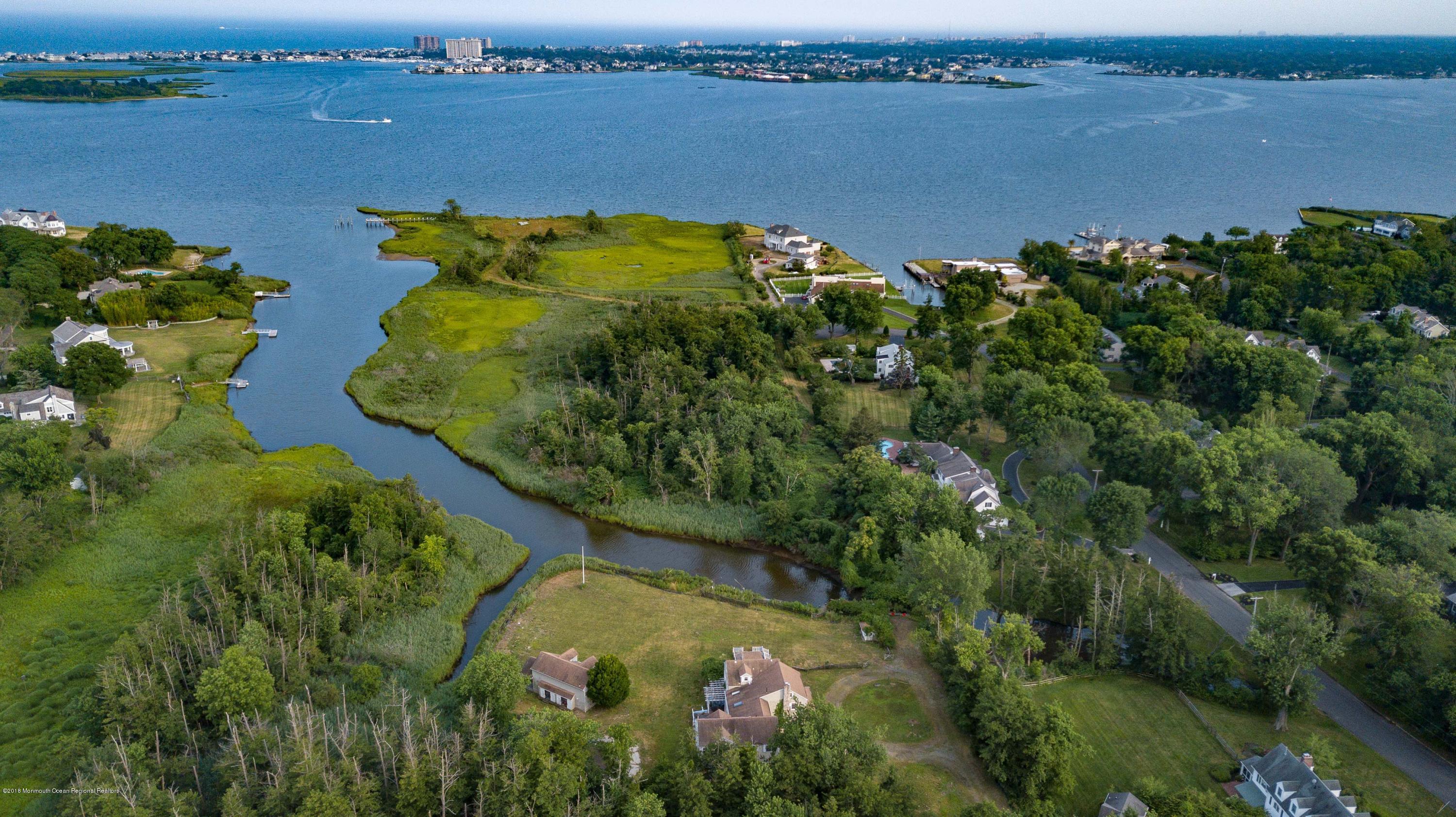115 Rumson Road Rumson, NJ 07760 - Photo 7 of 8 a view of a lake with a mountain view