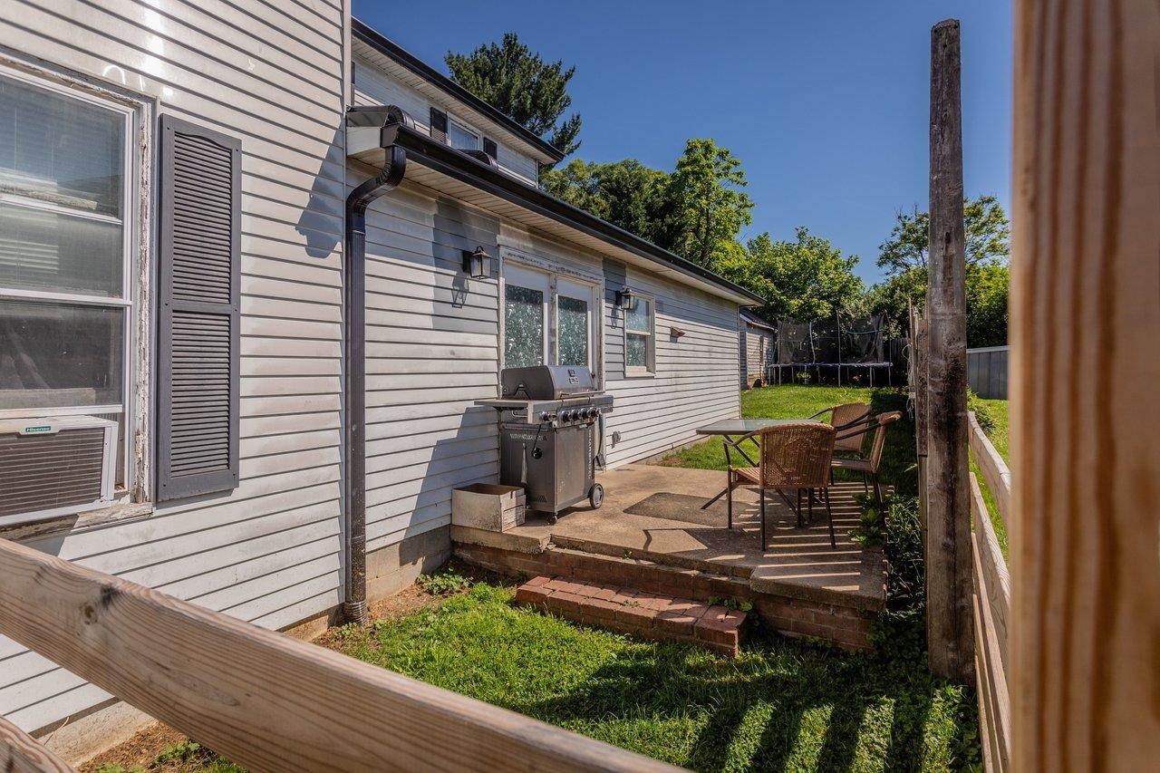 420 West Spring Street Woodstock, VA 22664 - Photo 57 of 67 a view of a patio with chairs and table in a patio