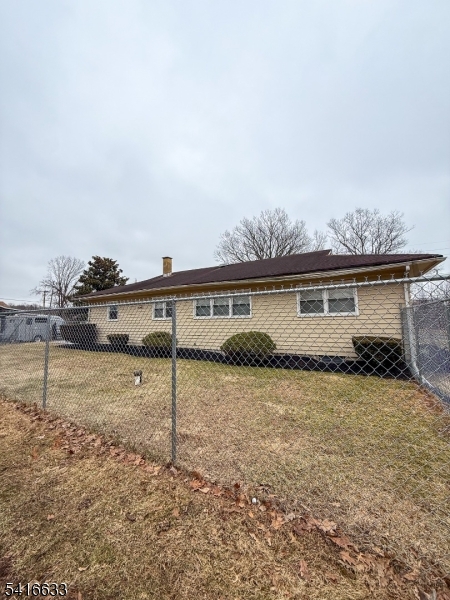4032 Quakerbridge Road Lawrence Township, NJ 08648 - Photo 9 of 9 a view of a house with a backyard