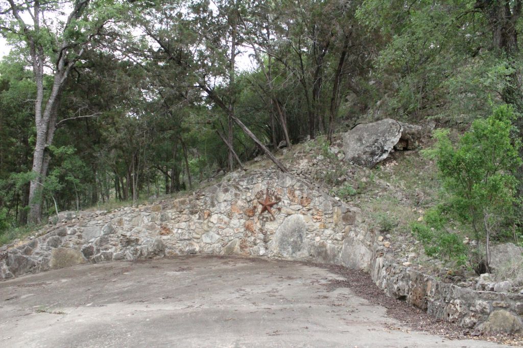 5135 Lookout Ridge Drive Marble Falls, TX 78654 - Photo 11 of 33 Stone wall lower patio or car turnaround by Lake Travis