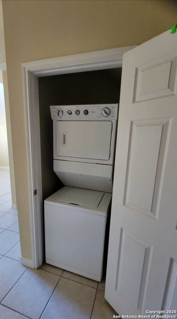 6160 Eckhert Road, Unit 107 San Antonio, TX 78240 - Photo 5 of 6 a utility room with dryer and washer