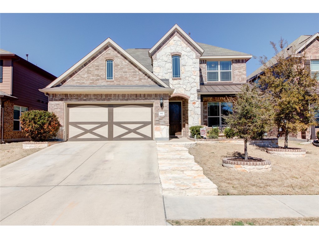 197 Shirley Drive Buda, TX 78610 - Photo 1 of 1 a view of a house with a outdoor space