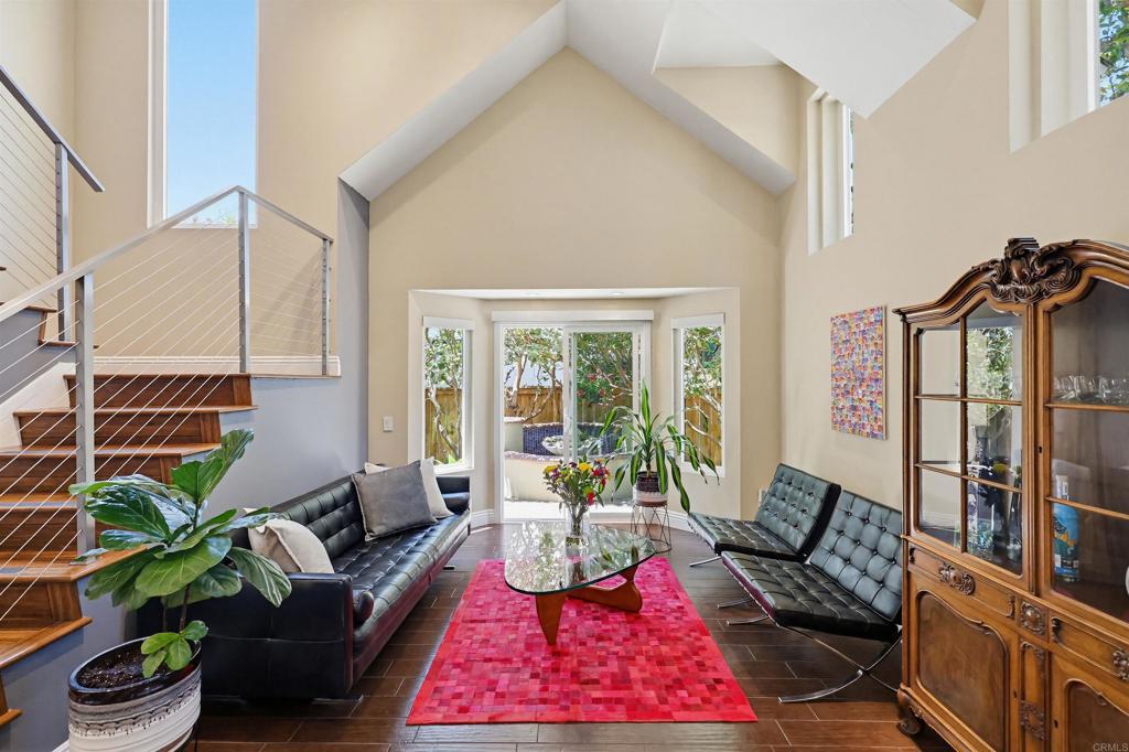 2756 Southampton Road Carlsbad, CA 92010 - Photo 10 of 40 a living room with furniture rug and a potted plant