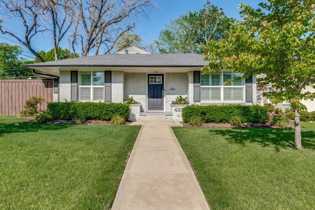 4303 Skillman Street Dallas, TX 75206 - Photo 2 of 25 a front view of a house with yard and green space