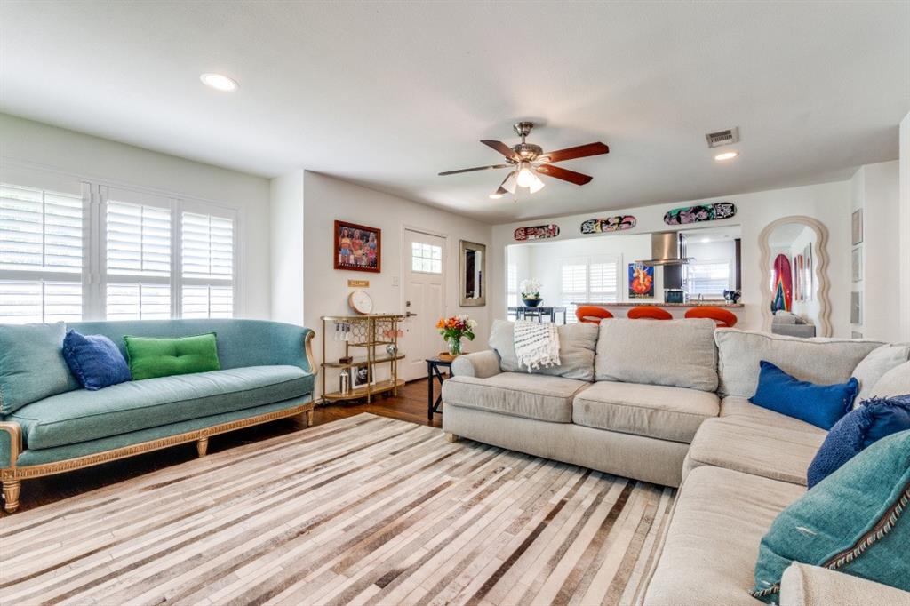 4303 Skillman Street Dallas, TX 75206 - Photo 4 of 25 a living room with furniture kitchen view and a large window