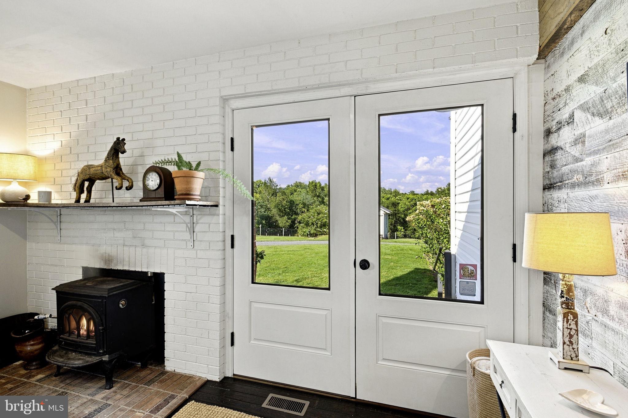 65 Dennis Road Castleton, VA 22716 - Photo 18 of 83 Double Doors Lead to outside Patio
