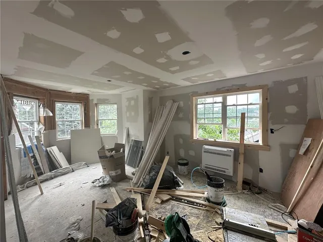 a picture of a bathroom with a shower curtain