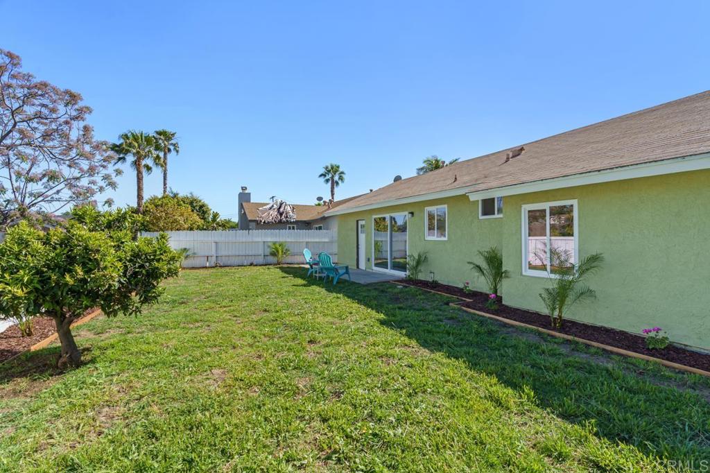 935 Swallow Drive Vista, CA 92083 - Photo 38 of 43 a view of house with backyard