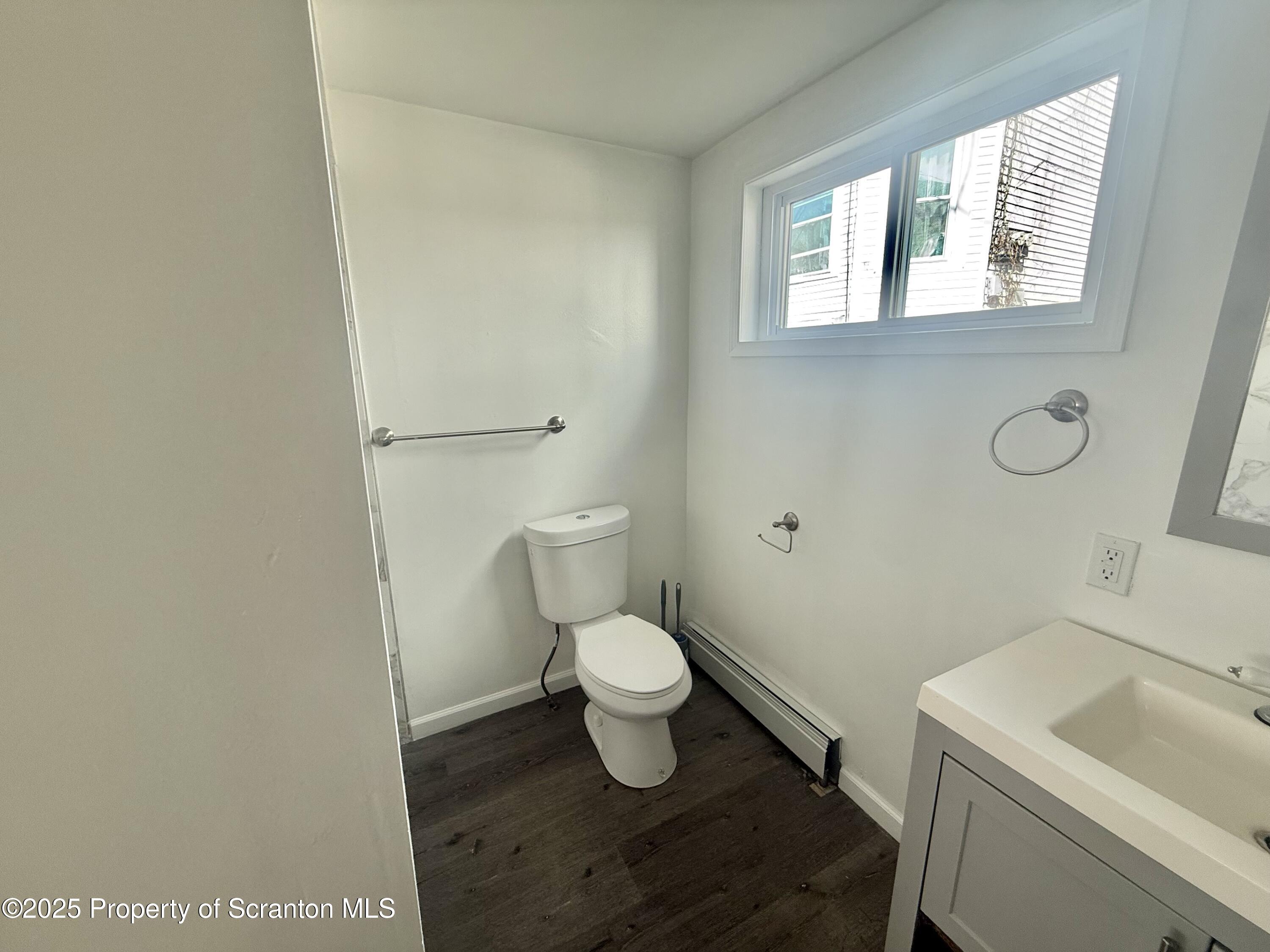 154 South Sumner Avenue Scranton, PA 18504 - Photo 14 of 15 a bathroom with a toilet and a sink