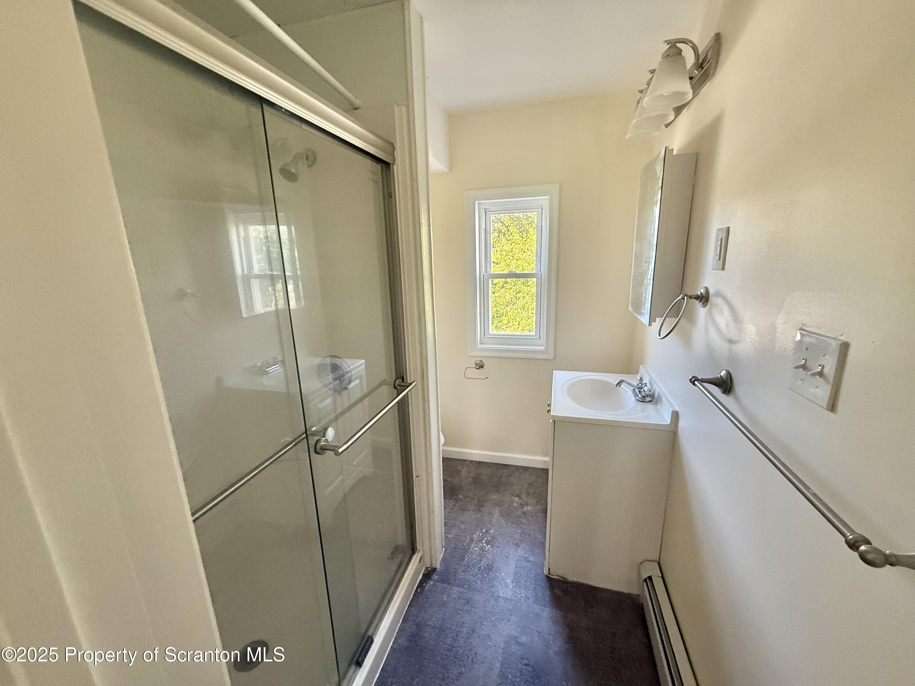 154 South Sumner Avenue Scranton, PA 18504 - Photo 6 of 15 a room with a sink and wooden floor