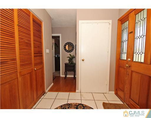 19 New Road Kendall Park, NJ 08824 - Photo 3 of 21 a view of an entryway with a door