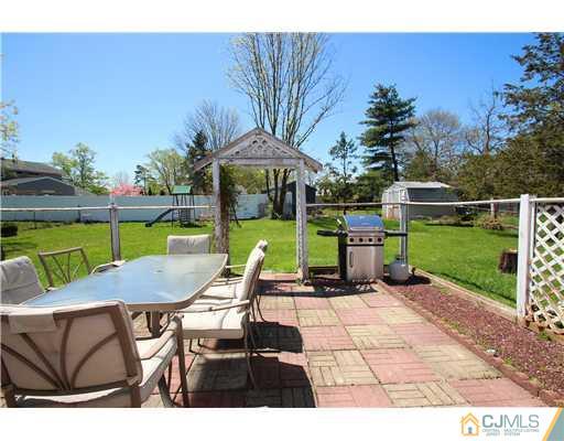 19 New Road Kendall Park, NJ 08824 - Photo 21 of 21 a view of outdoor space yard deck and patio