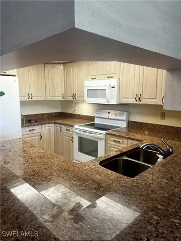 $213,900 | 5765 Trailwinds Drive, Unit 115, Fort Myers, FL 33907