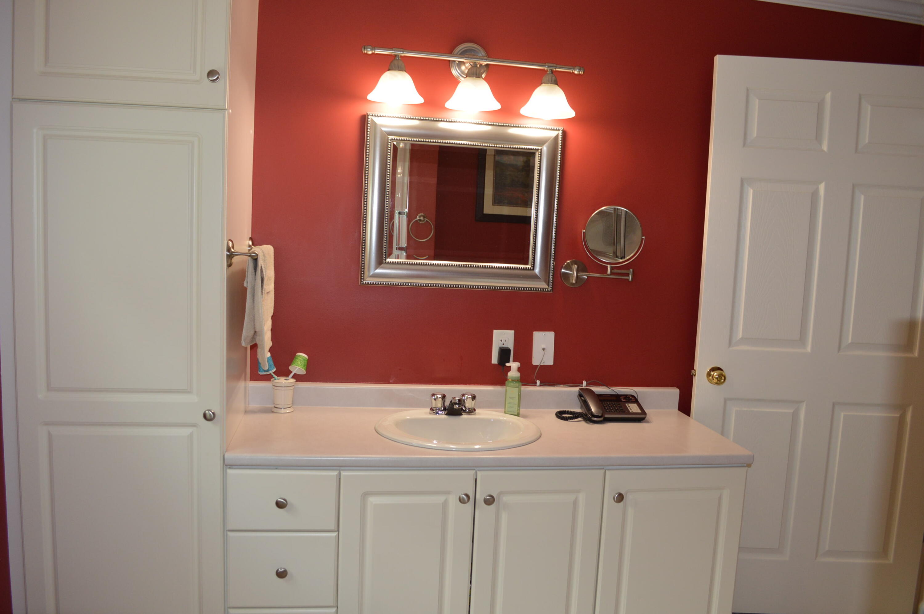 25 Pine Street Fort Kent, ME 04743 - Photo 25 of 32 Bathroom with plenty of storage space