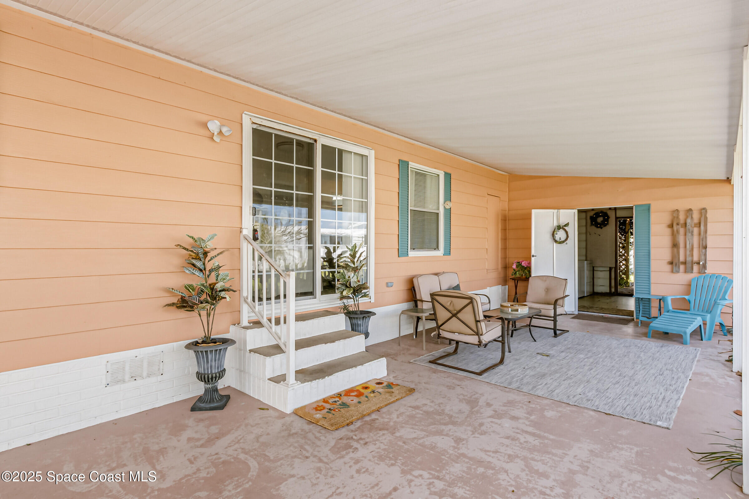 520 Ruth Circle Melbourne, FL 32904 - Photo 3 of 25 520 Ruth side door