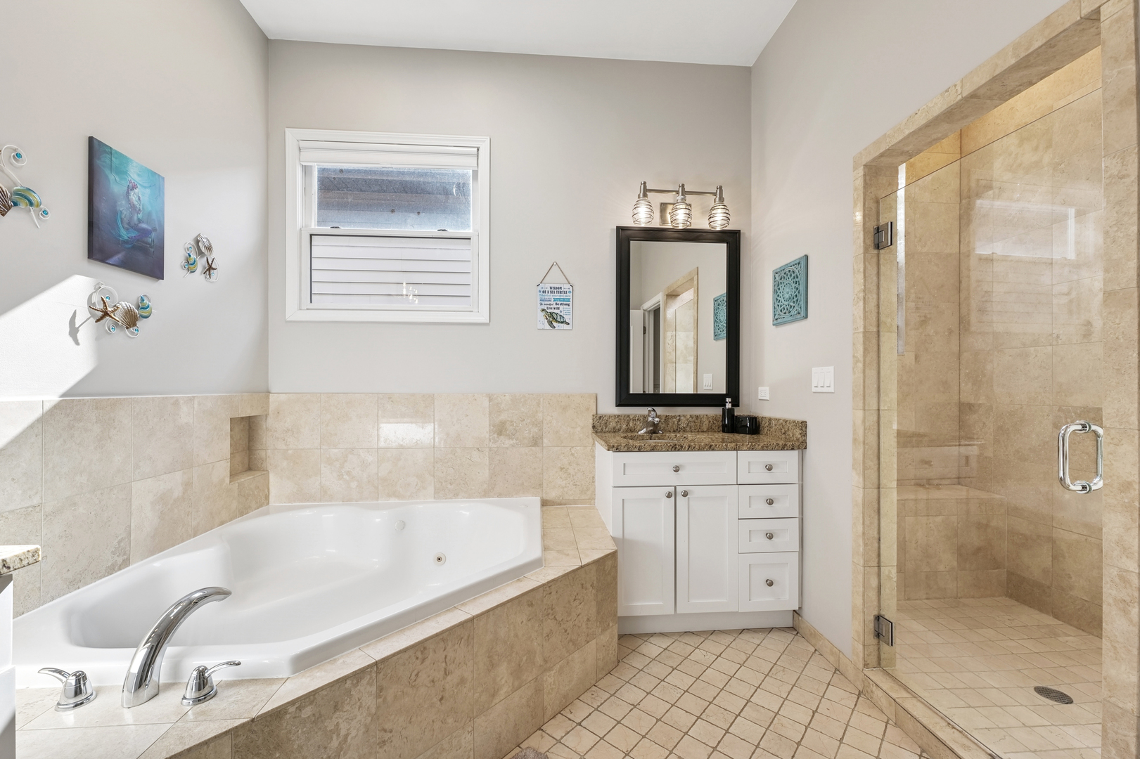 4038 West Addison Street Chicago, IL 60641 - Photo 14 of 33 a bathroom with a granite countertop tub sink and mirror