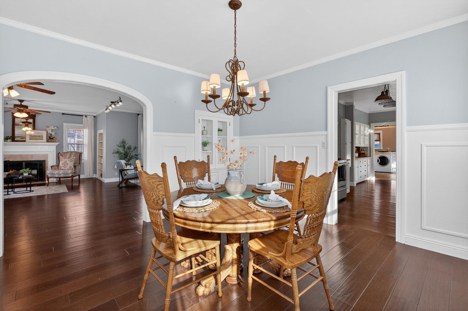 2644 Crafton Way Stockton, CA 95204 - Photo 14 of 50 a dining room with furniture wooden floor and a chandelier