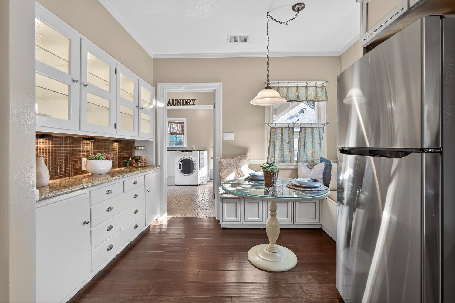 2644 Crafton Way Stockton, CA 95204 - Photo 19 of 50 a kitchen with stainless steel appliances granite countertop a sink a refrigerator a stove and white cabinets