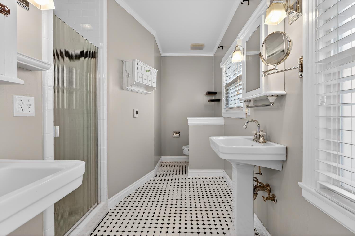 2644 Crafton Way Stockton, CA 95204 - Photo 26 of 50 a bathroom with a sink a toilet and a mirror