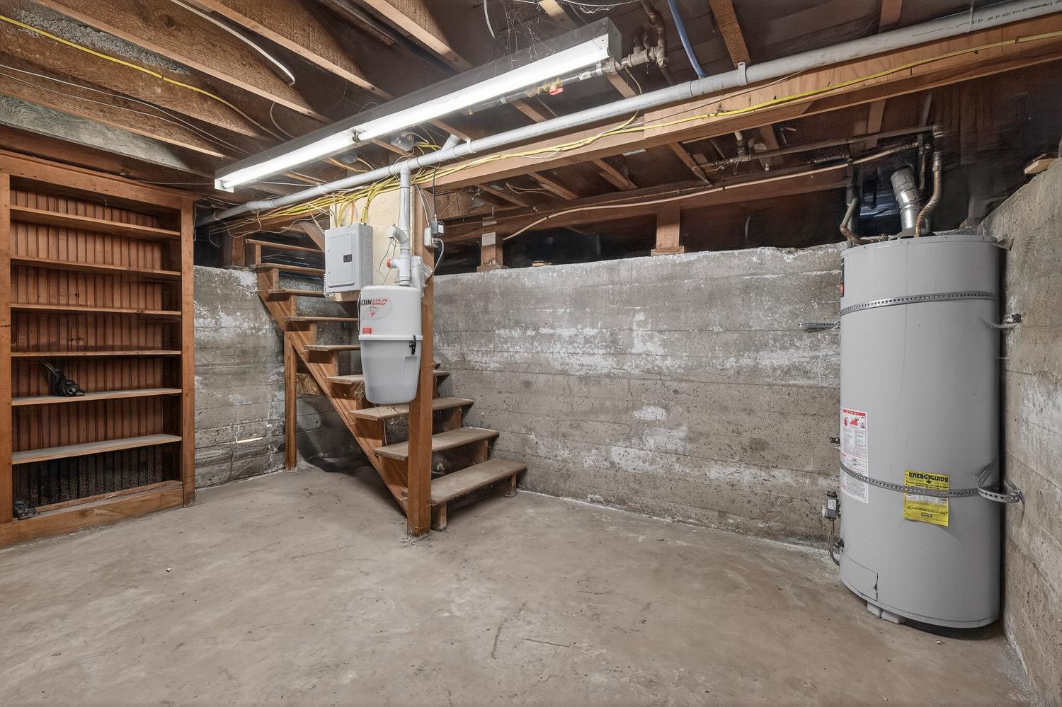 2644 Crafton Way Stockton, CA 95204 - Photo 37 of 50 a view of an empty room with wooden shelves