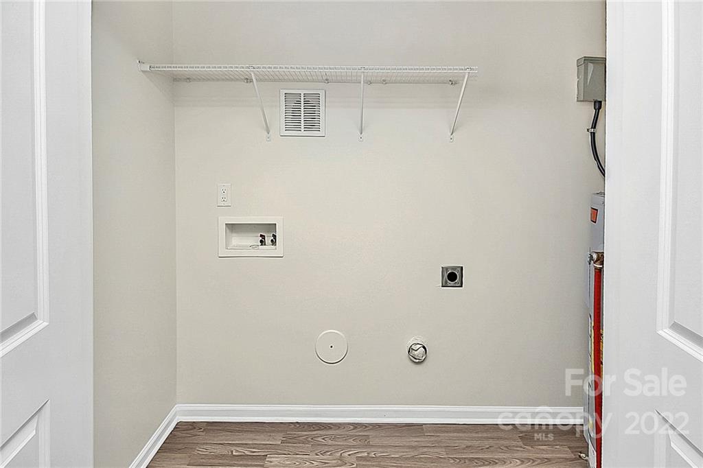 8729 Pence Road Charlotte, NC 28215 - Photo 14 of 26 a view of a livingroom with an empty space