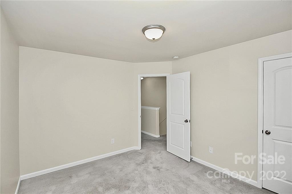 8729 Pence Road Charlotte, NC 28215 - Photo 19 of 26 a view of an empty room