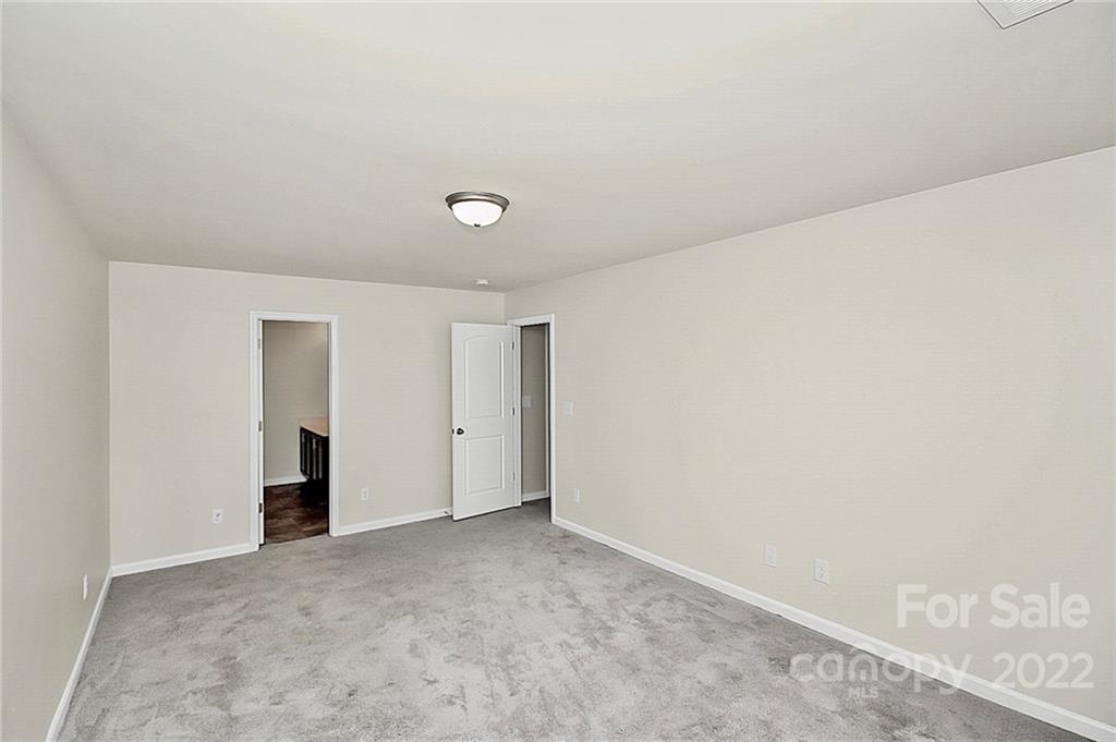 8729 Pence Road Charlotte, NC 28215 - Photo 21 of 26 a view of an empty room
