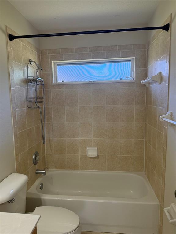 4833 Post Pointe Drive Sarasota, FL 34233 - Photo 23 of 29 a bathroom with a shower and a toilet