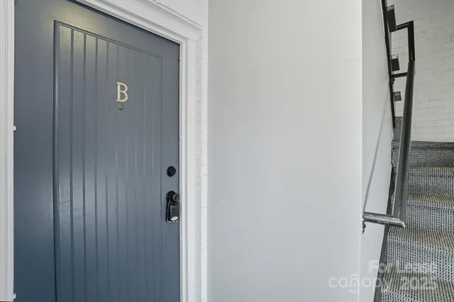 a view of room with hardwood floor