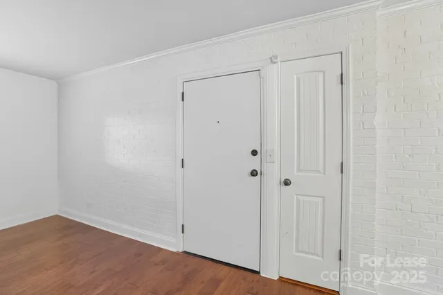 a view of a kitchen with a sink and a stove top oven