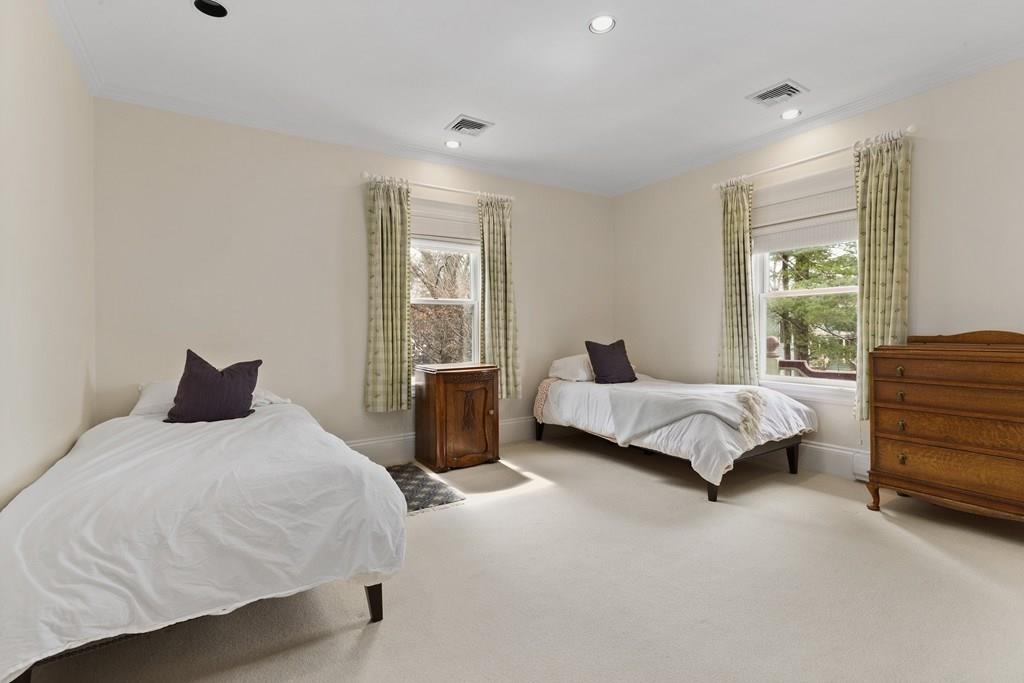 28 Balcarres Road Newton, MA 02465 - Photo 11 of 21 a bedroom with a bed and a couch
