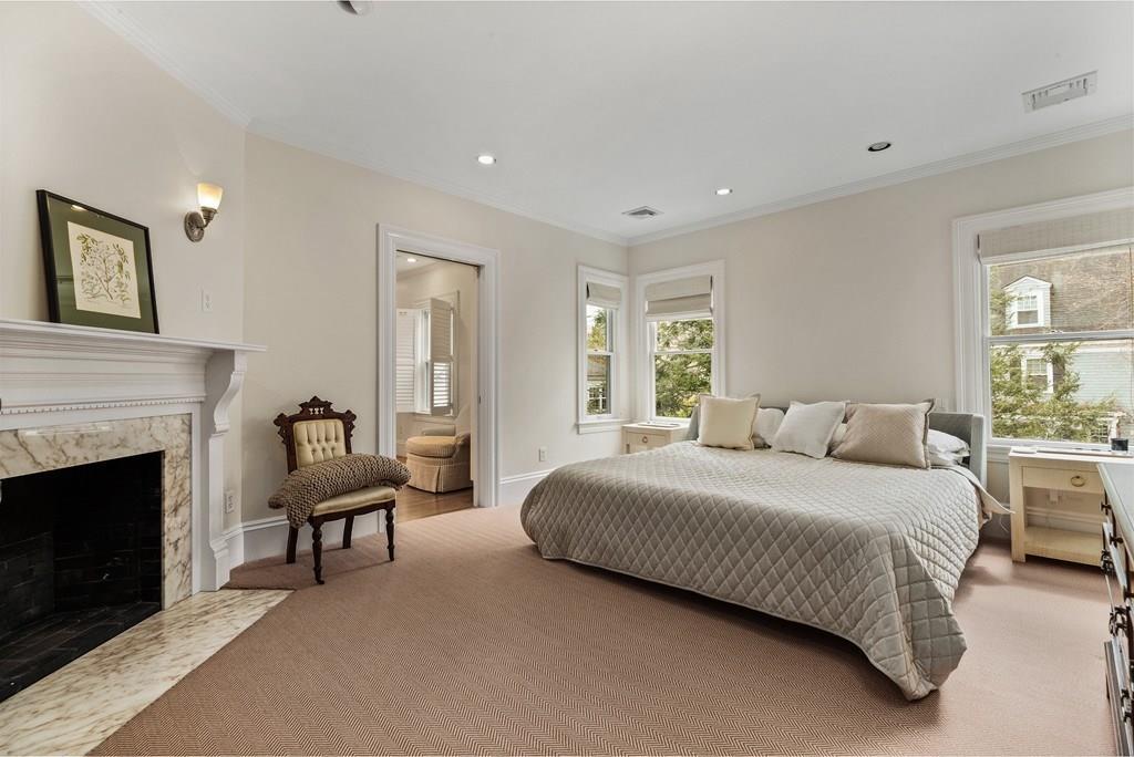 28 Balcarres Road Newton, MA 02465 - Photo 12 of 21 a bedroom with a bed and a fireplace