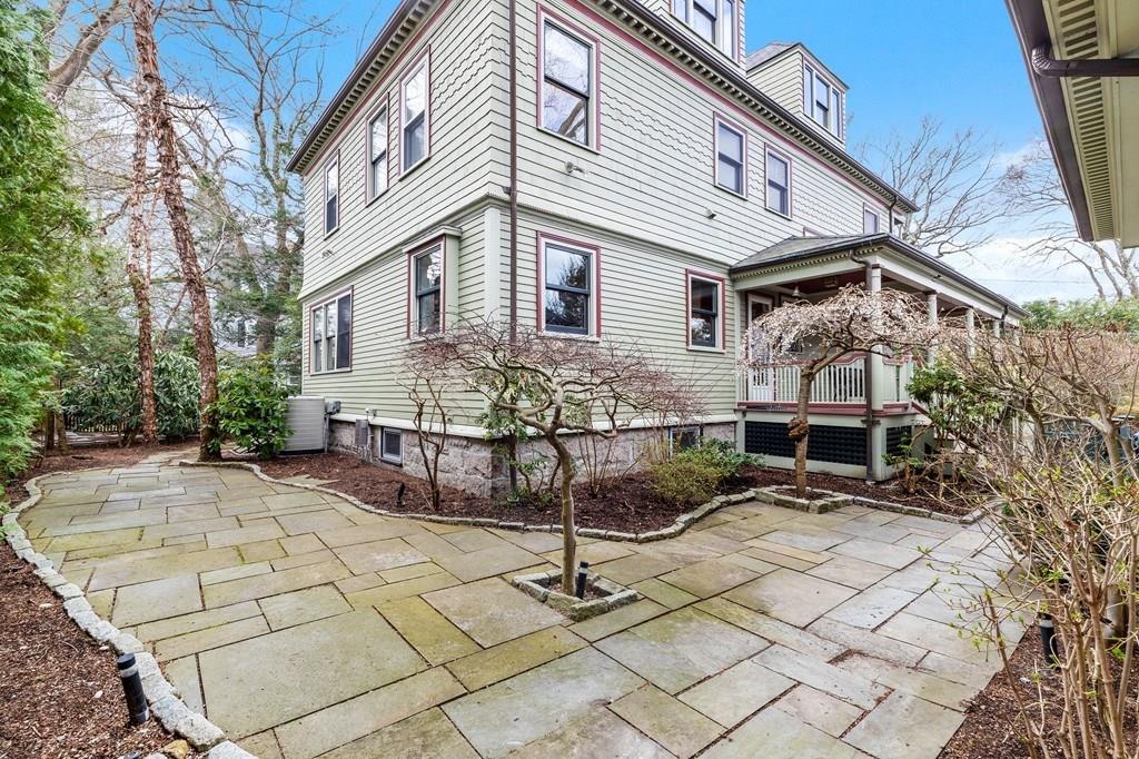 28 Balcarres Road Newton, MA 02465 - Photo 20 of 21 a view of house with a bench in patio