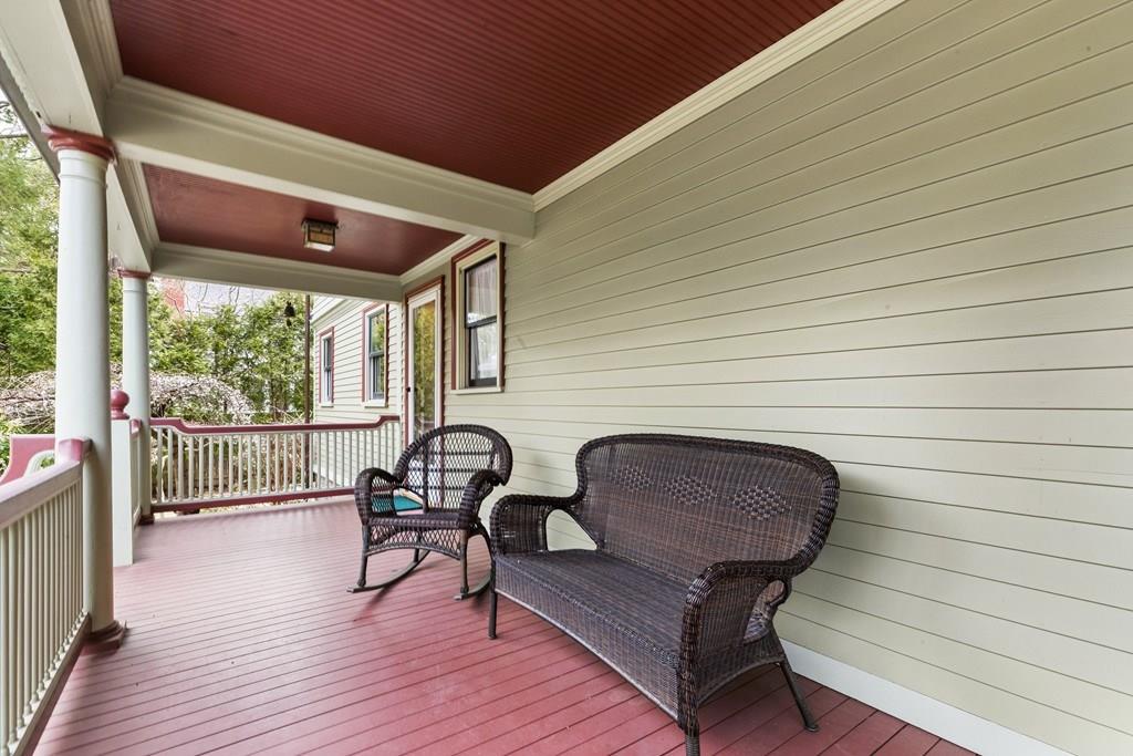 28 Balcarres Road Newton, MA 02465 - Photo 2 of 21 a balcony with wooden floor and furniture