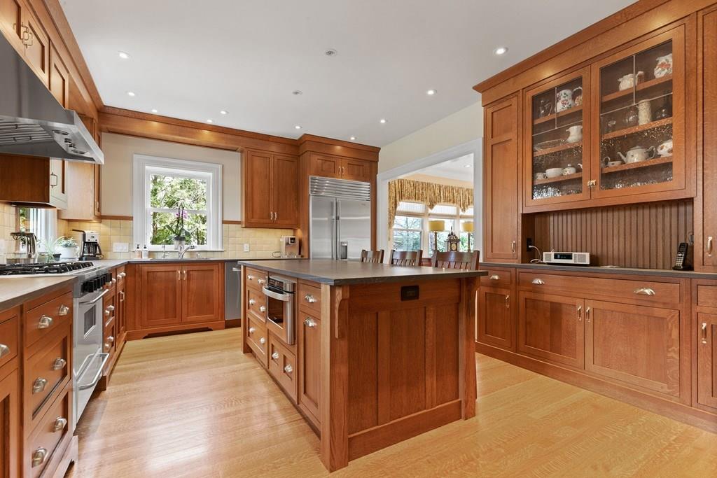 28 Balcarres Road Newton, MA 02465 - Photo 3 of 21 a large kitchen with stainless steel appliances granite countertop a stove a sink and a refrigerator
