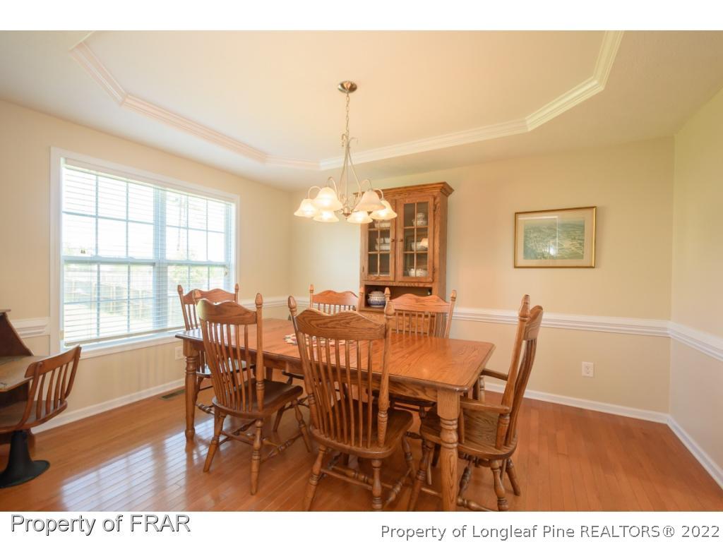 11 Lattimore Road Cameron, NC 28326 - Photo 12 of 28 a view of a dining room with furniture and window