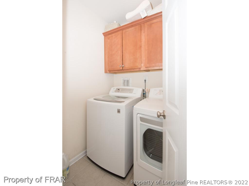 11 Lattimore Road Cameron, NC 28326 - Photo 14 of 28 a utility room with dryer and washer
