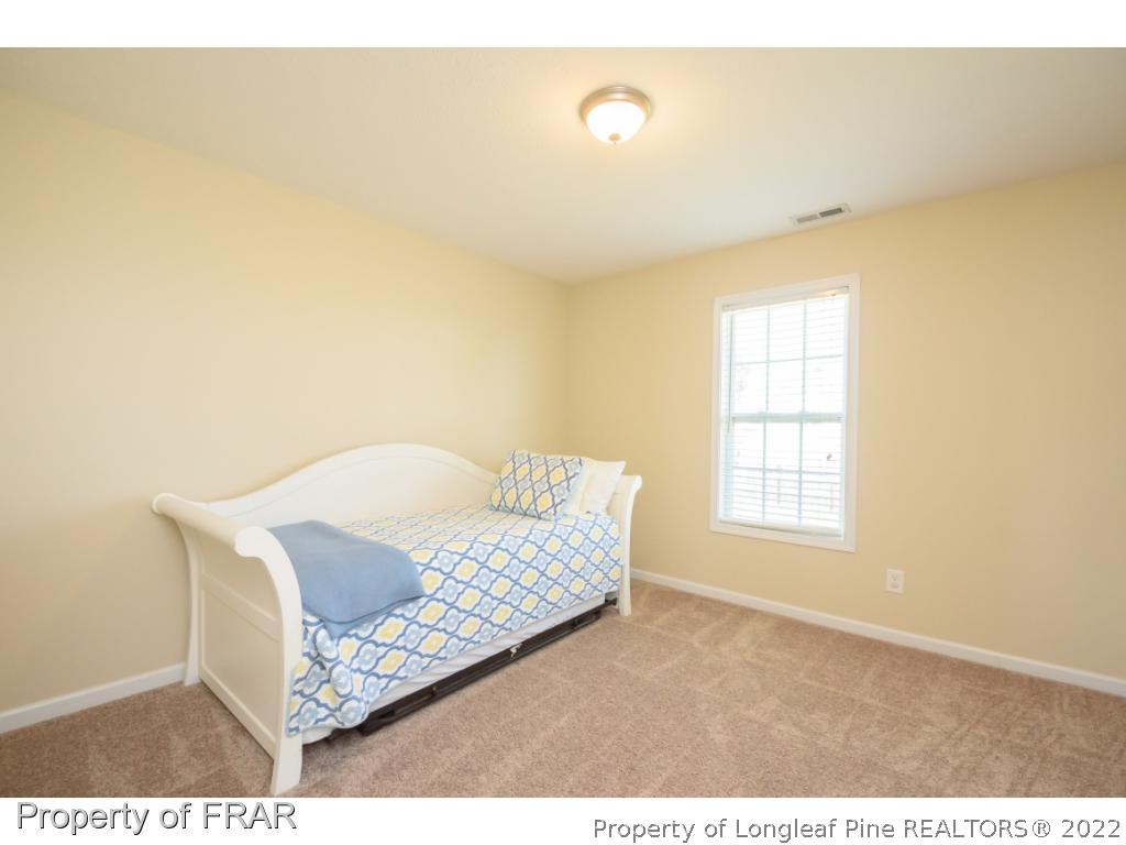 11 Lattimore Road Cameron, NC 28326 - Photo 20 of 28 a living room with furniture and a window