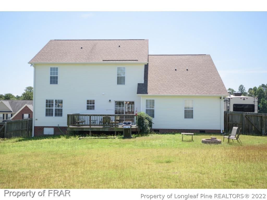 11 Lattimore Road Cameron, NC 28326 - Photo 2 of 28 a view of a house with a swimming pool